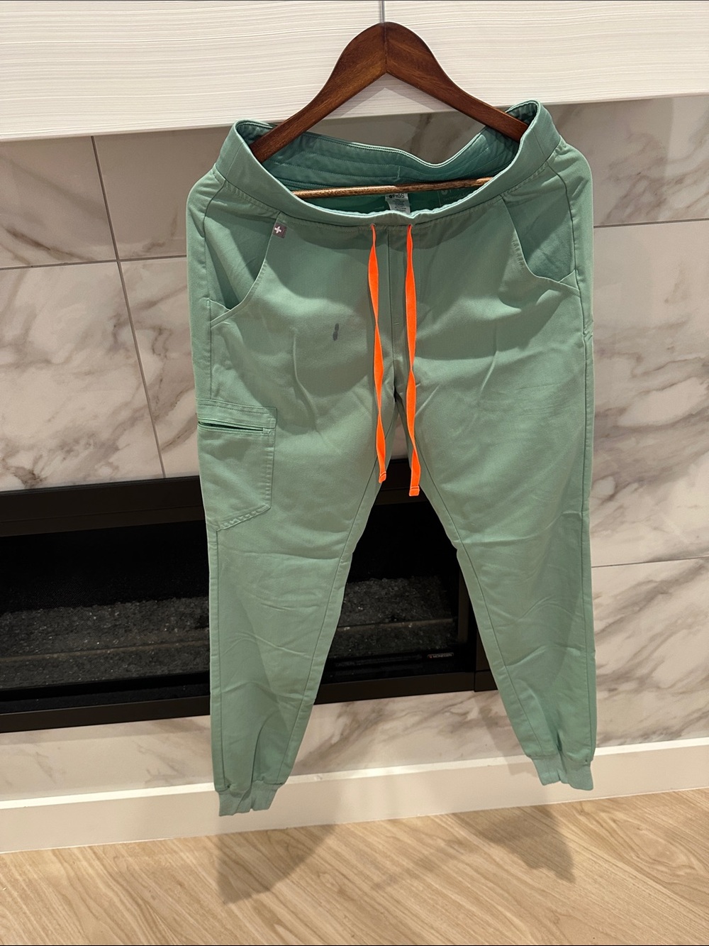 FIGS Women’s Mint Green Jogger Pants with Orange Drawstring
